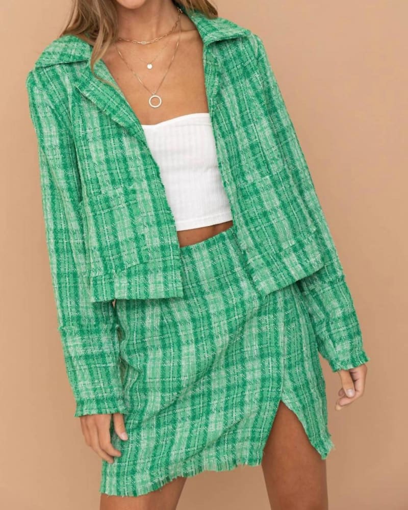 Front of a model wearing a size Large Lightweight Tweed Slit Skirt in Green in Green by Blue B. | dia_product_style_image_id:339223